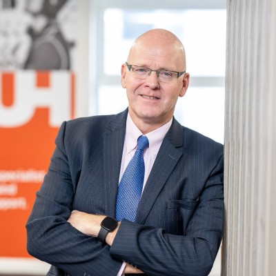 Neil Gordon, CEO at GUH